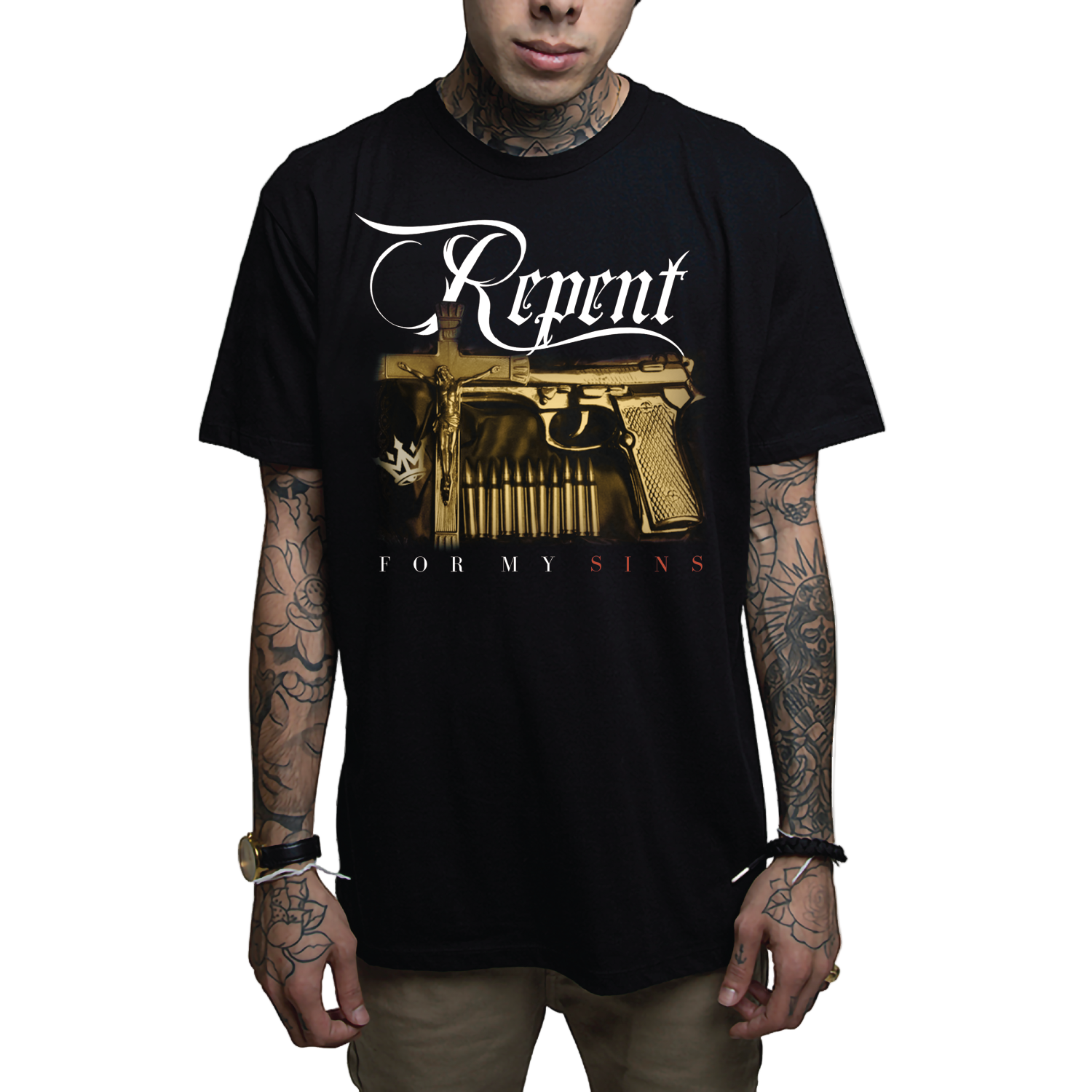 A person wearing a black t-shirt with 'Repent' text and a golden gun design on the front.